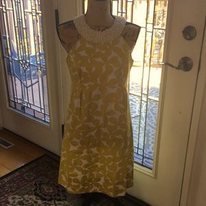 Yellow and white print dress